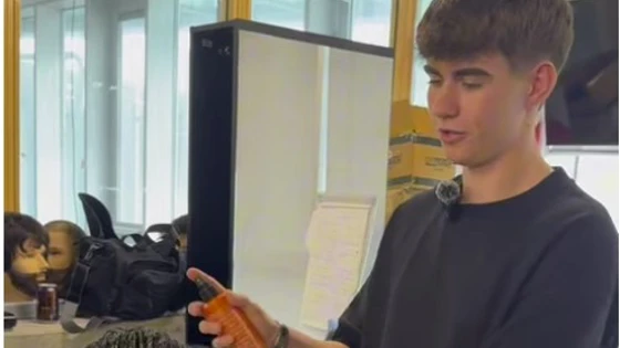Hairdressing student Marcus demonstrates how to cut and style a modern mullet on a training mannequin at Glasgow Kelvin College. Hairdressing student Marcus demonstrates how to cut and style a modern mullet on a training mannequin at Glasgow Kelvin College.